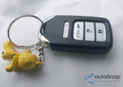 2015 Honda Cr-V Touring z USA, uszkodzony, nr VIN 5J6RM4H96FL120845